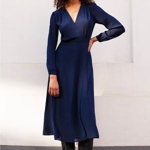 Babaton navy long-sleeve wrap dress.   Never warn with tags.